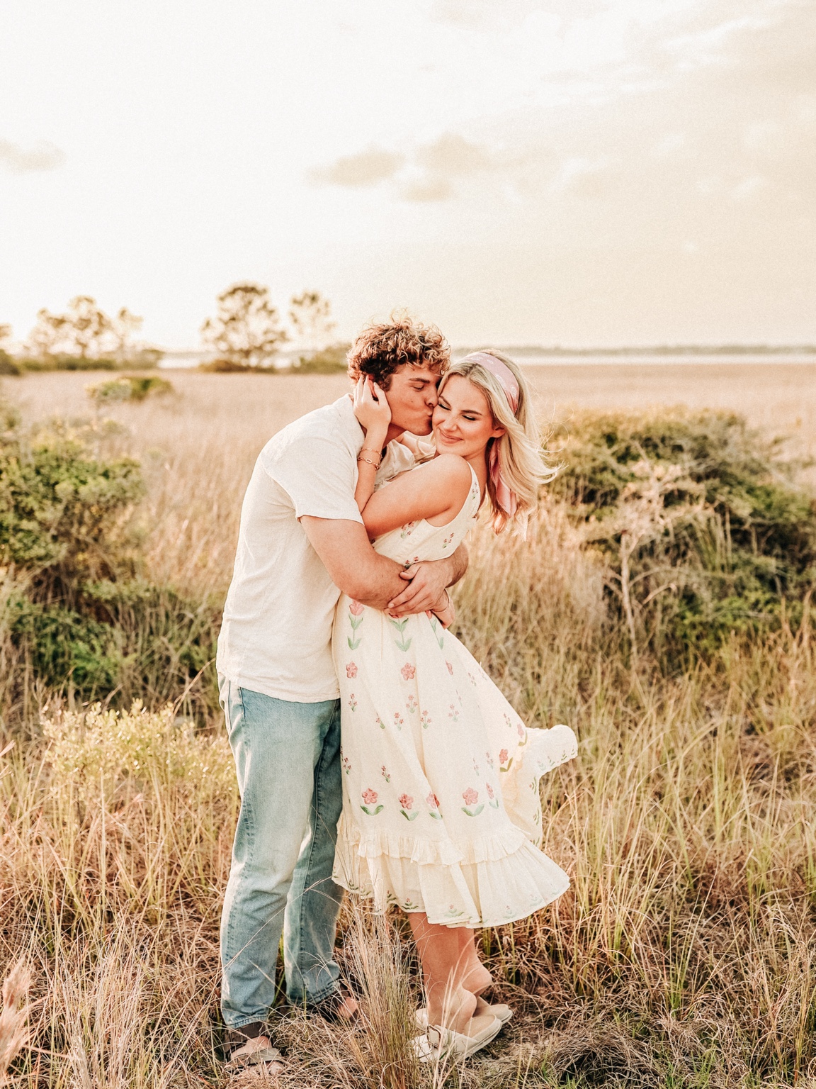 Couple wearing soft timeless colors with texture and movement
